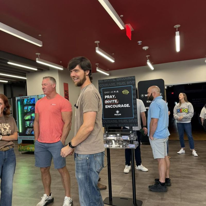 People talking and connecting in the Riverwood lobby before the service